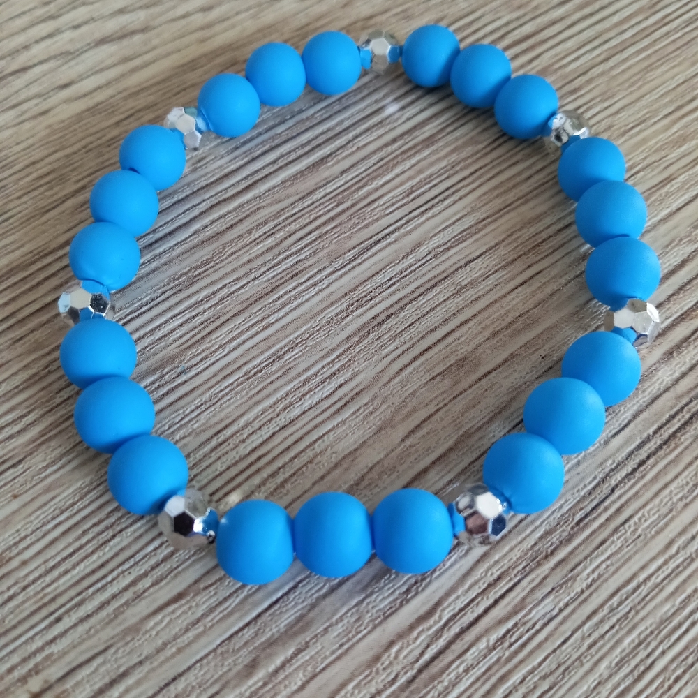 hand crafted Bright blue and silver crystal beaded statement stretchy bracelet
